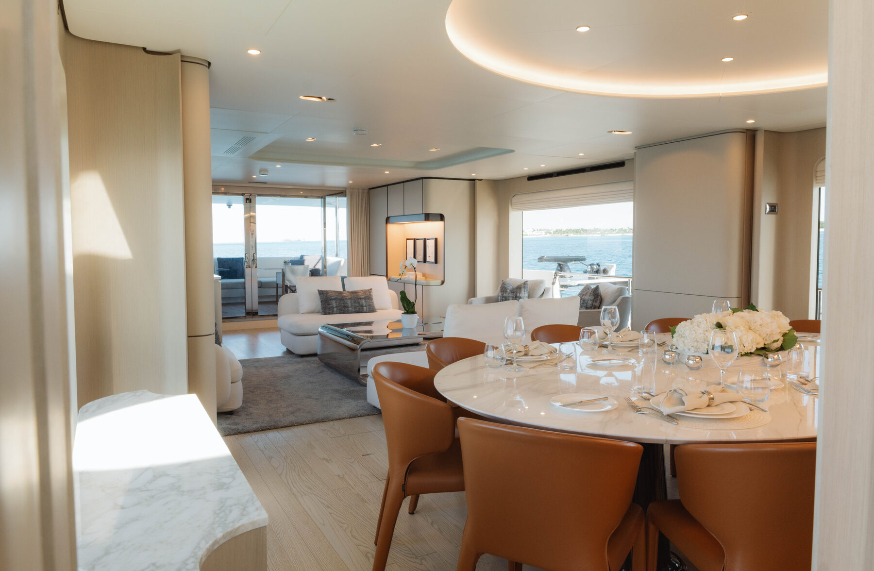 Open plan dining and living with marble table