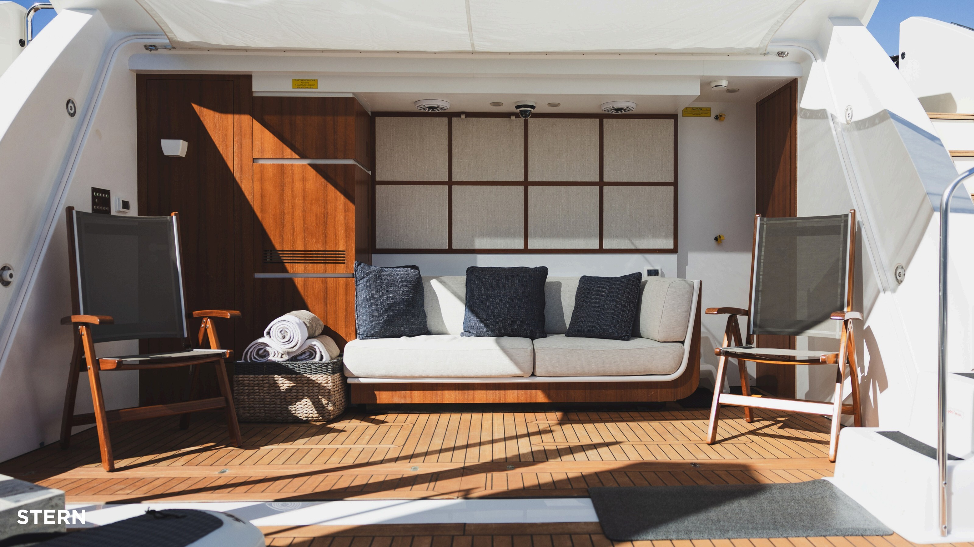 Stern with seating and beach club access