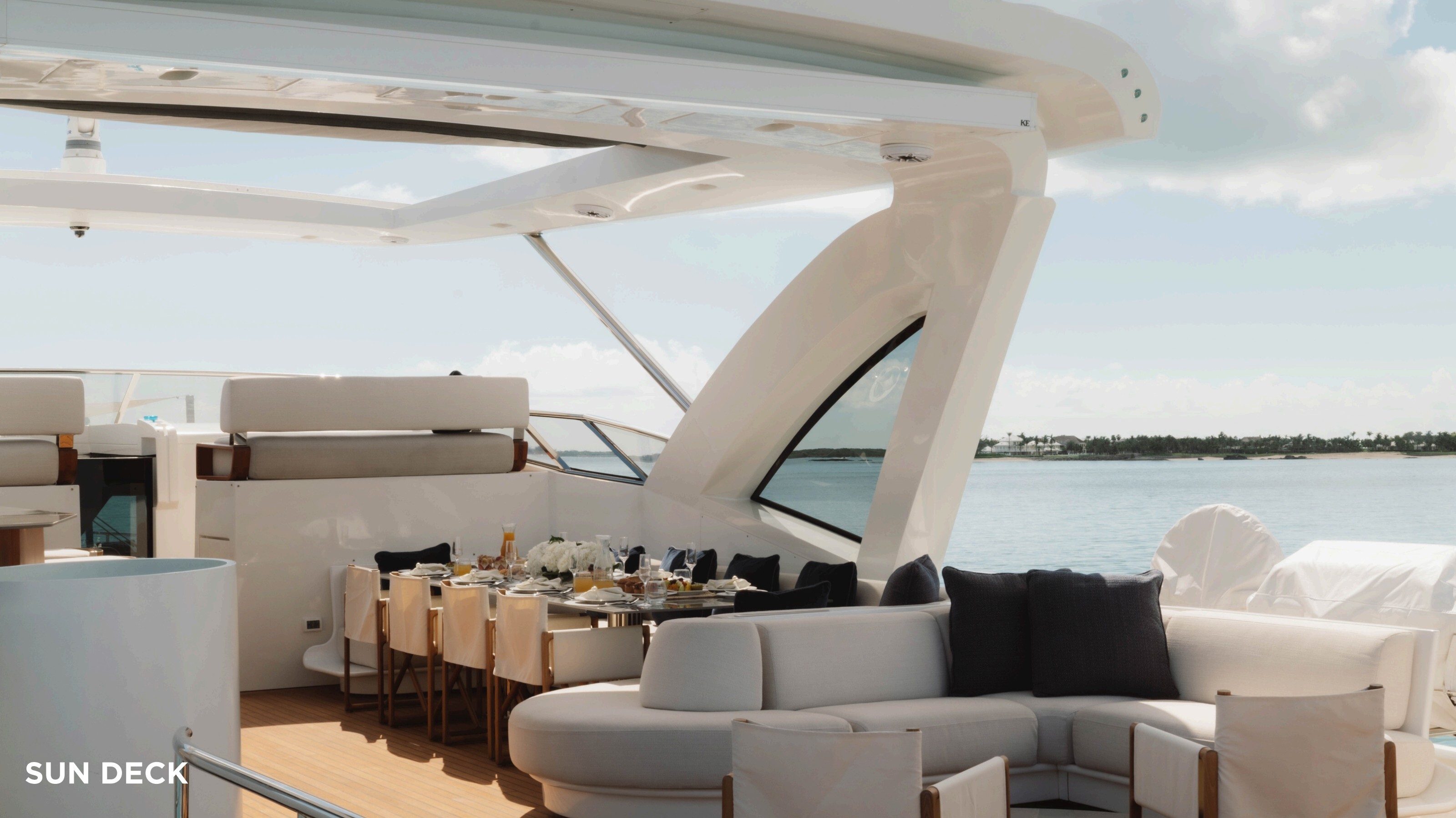 Sun deck dining and seating with ocean views